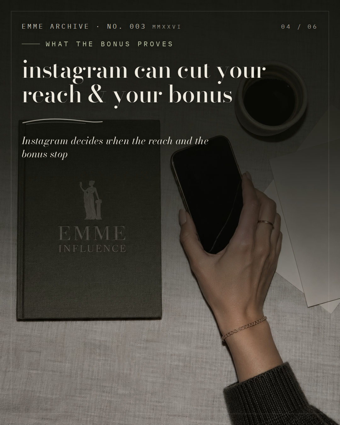 A closed olive notebook foil blocked with the EMME Influence mark beside a hand holding a phone and a black coffee